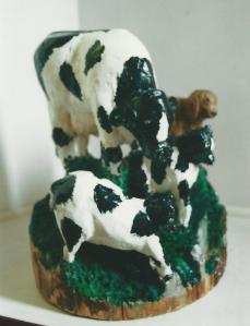 a group of cows by Andre Laporte