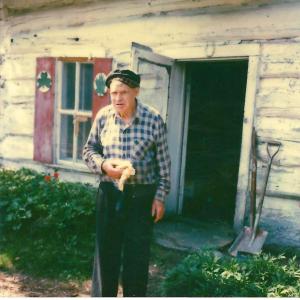 Billy in front of his cabin